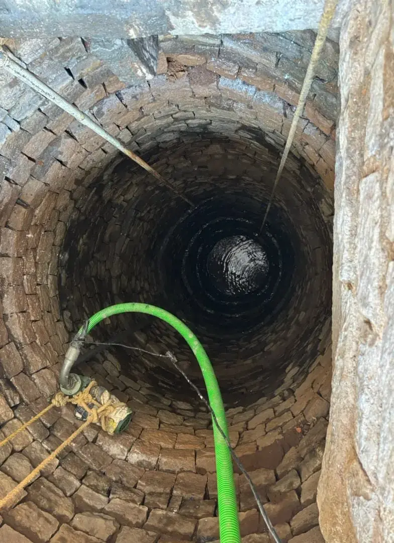 Open water well construction